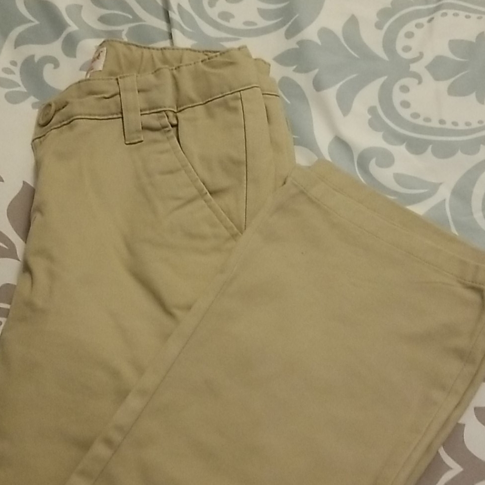 Girls khaki bootcut pants.